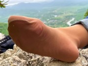 Preview 4 of Goddess cute toes wiggling in fragrance nylon socks with jeans on the top of the mountain