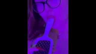 beautiful student licks her juicy hairbrush on camera