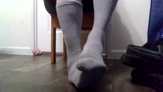 Taking slippers and socks off and rubbing dirty feet!!