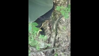 A young guy jerks off in the woods. the guy wants to have sex. sweatpants. sneakers. Pissing.