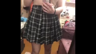 Pretty girl shows off her skirt.