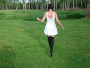Preview 1 of Seductive Milf walking in the park with Black High Boots